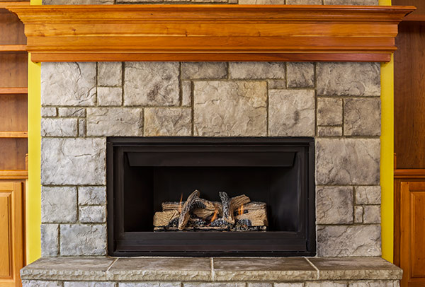 A gas fireplace that’s not working due to a common gas fireplace problem.