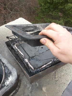 Repairing a damaged chimney cap