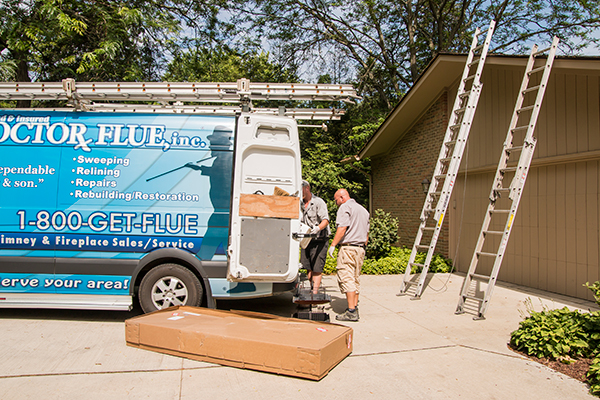 Doctor Flue performing a chimney repair in Michigan.