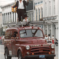 Doc and family riding Doctor Flue's first truck