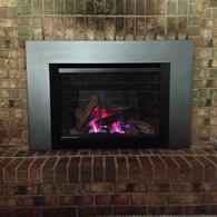 Converting an open inefficient fireplace to a high efficiency gas insert