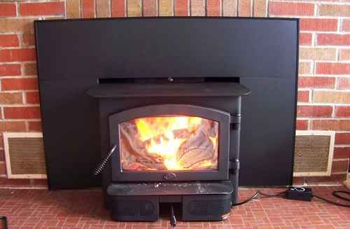 Fireplace lit with a roaring fire