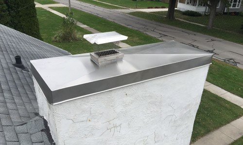 Side view with new chimney cap