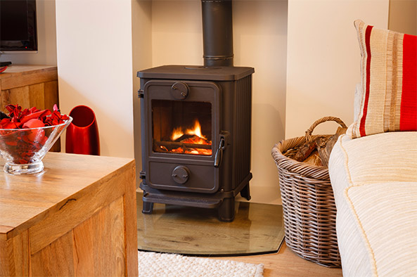 Lit woodstove in a home
