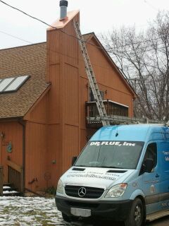 Doctor Flue technician inspecting a chimney
